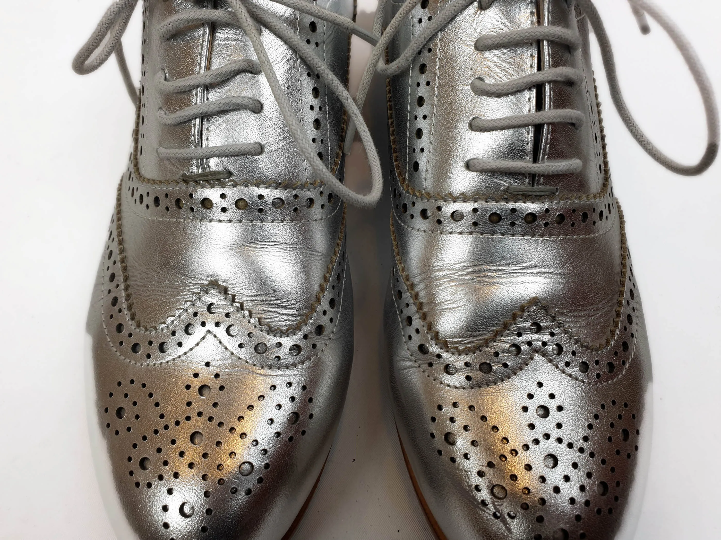 Bared silver brogue style laceups size 39