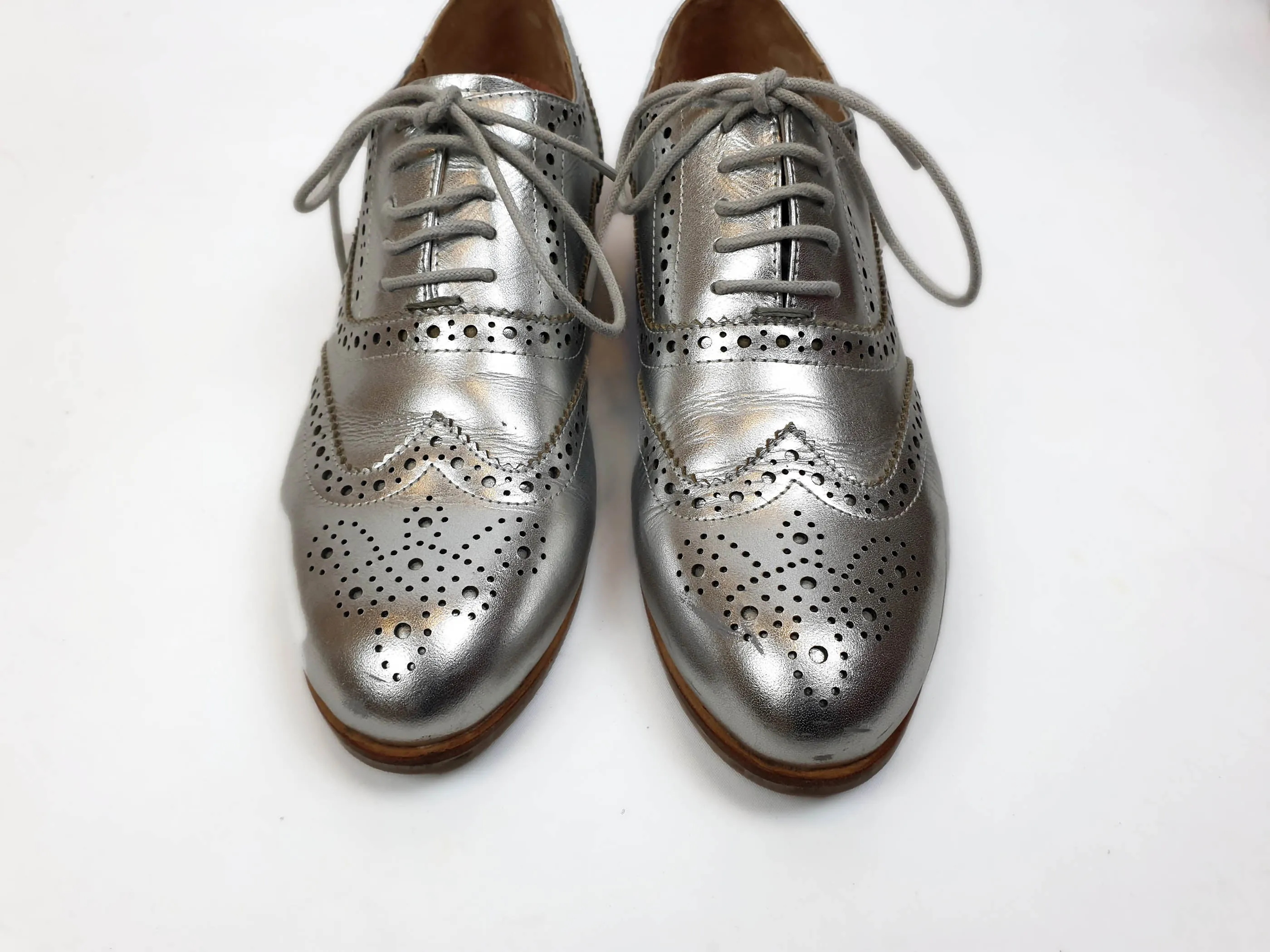 Bared silver brogue style laceups size 39