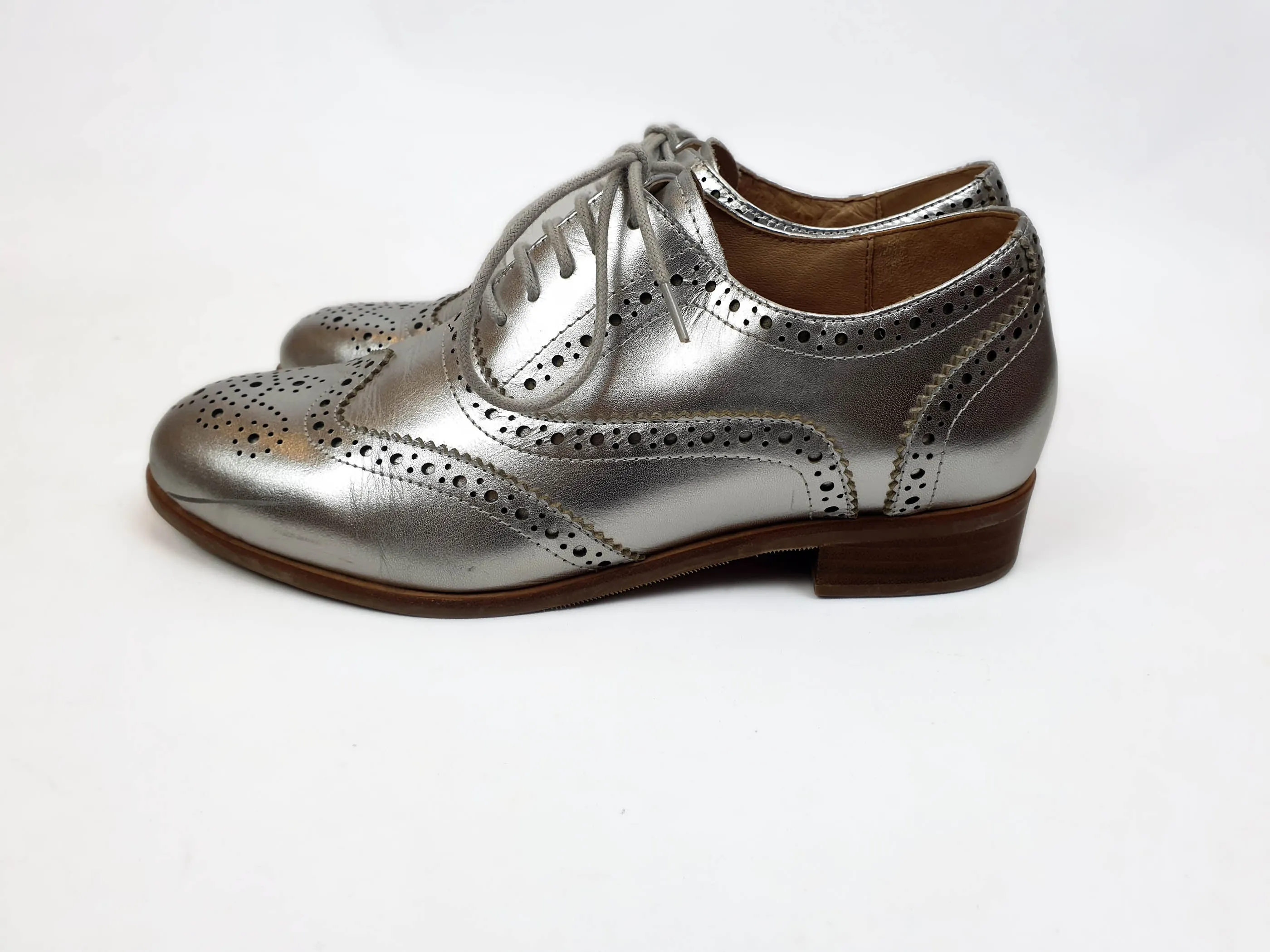 Bared silver brogue style laceups size 39