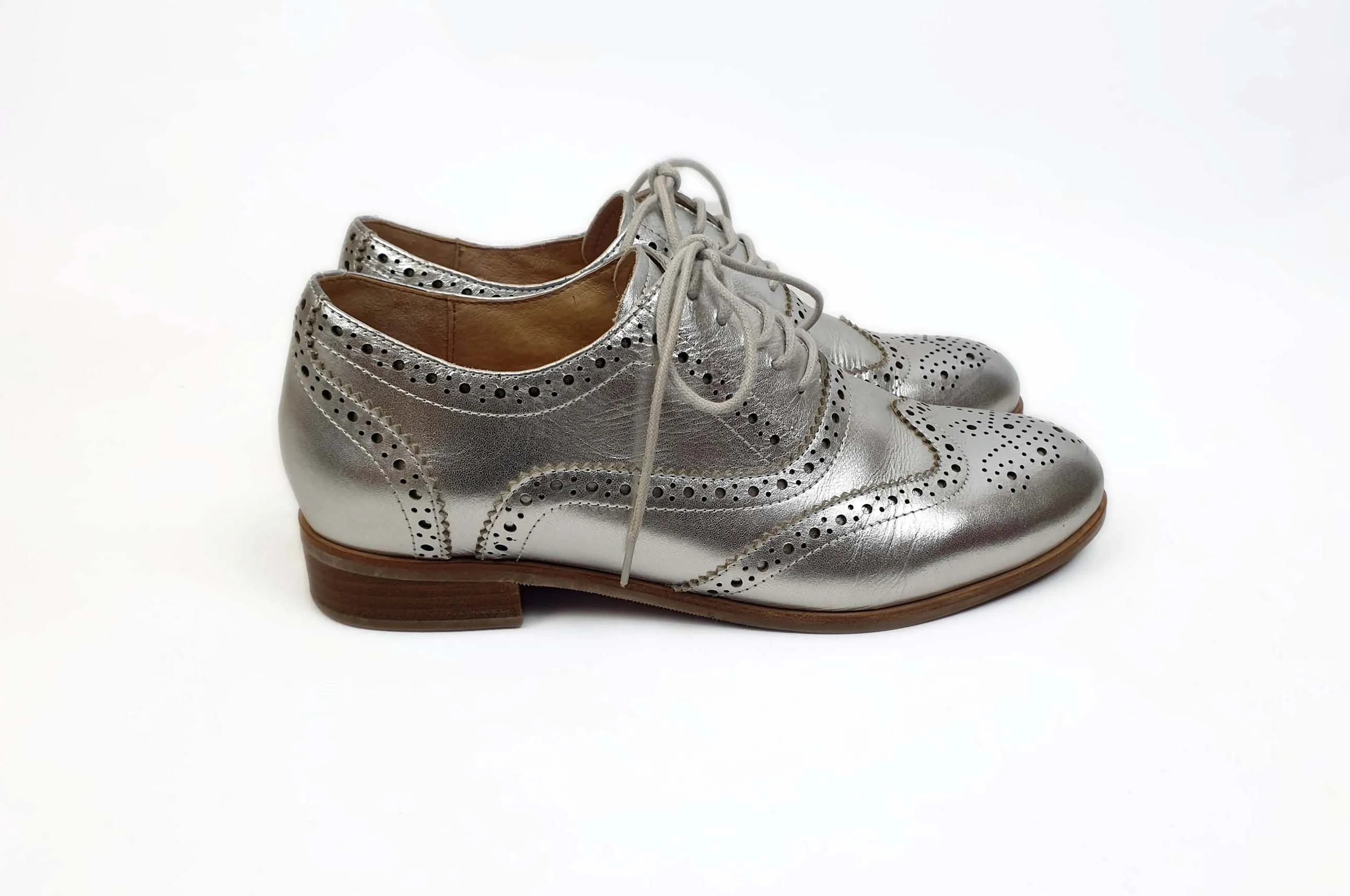 Bared silver brogue style laceups size 39