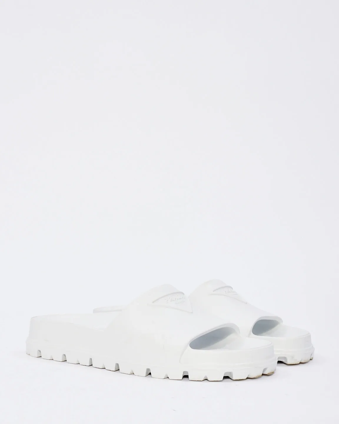 Prada White Rubber Triangle Logo Embossed Lug Sole Slides  - 38