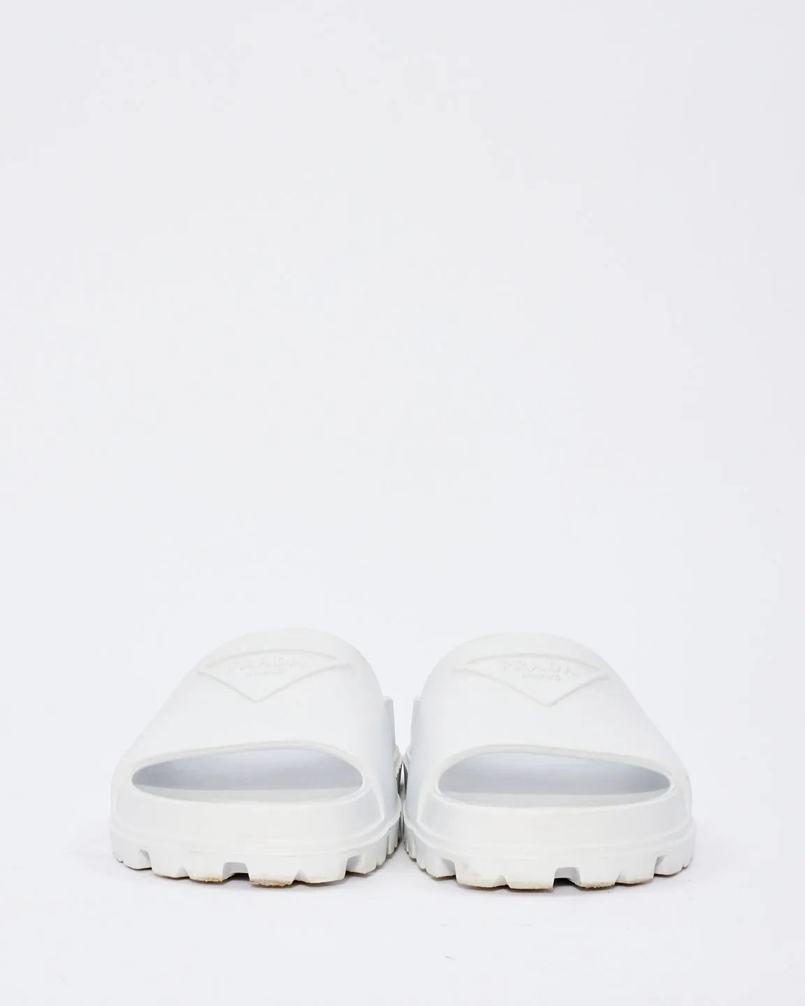 Prada White Rubber Triangle Logo Embossed Lug Sole Slides  - 38